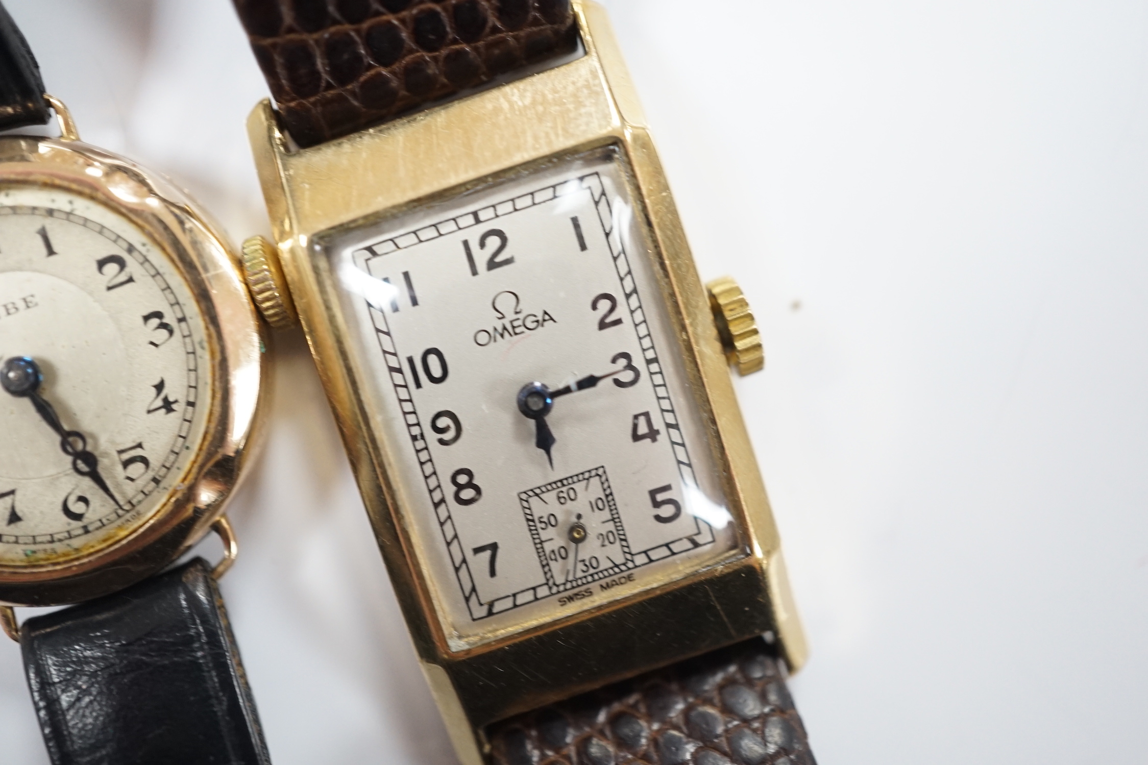 A lady's 1930's 9ct gold Omega manual wind wrist watch, on a later leather strap and a lady's 9ct gold Bebe wrist watch.